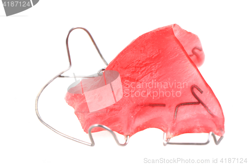 Image of pink braces isolated