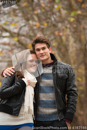 Image of Happy young Couple in Autumn Park