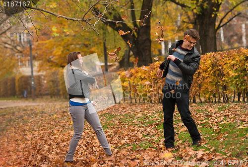 Image of Happy young Couple in Autumn Park