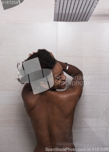 Image of African American woman in the shower