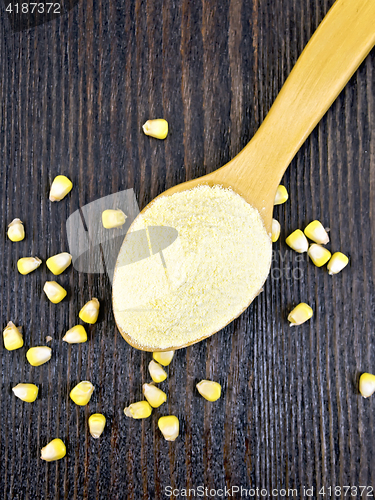 Image of Flour corn in spoon on board top