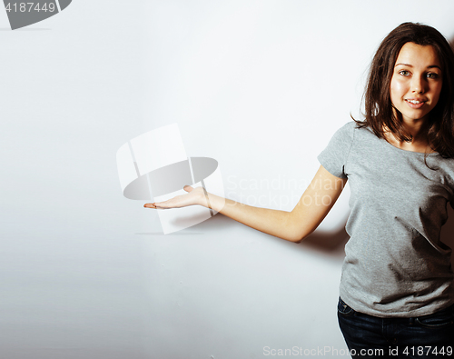 Image of young pretty stylish hipster girl posing emotional isolated on white background happy smiling cool smile, lifestyle people concept 