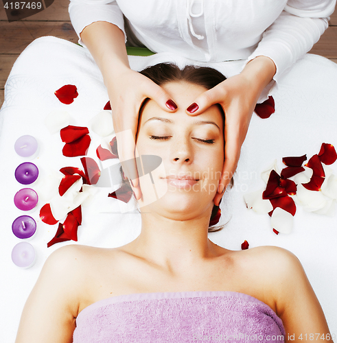 Image of stock photo attractive lady getting spa treatment in salon, heal