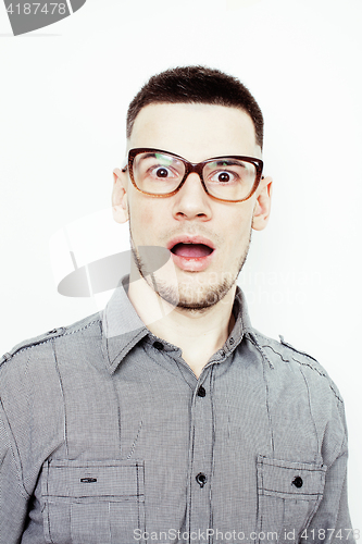 Image of young handsome well-groomed guy posing emotional on white background, lifestyle people concept