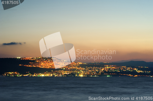 Image of Lake Kinneret on the Sunset and the lights of Tiberias