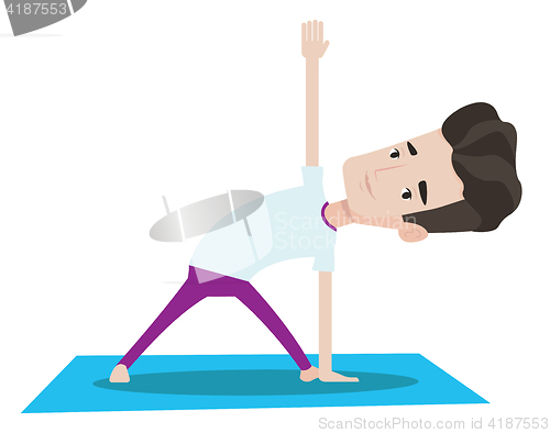Image of Man practicing yoga triangle pose.