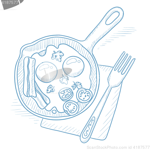 Image of Fried eggs with bacon on frying pan.