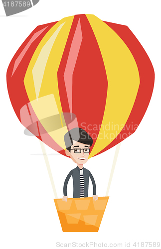 Image of Man flying in hot air balloon vector illustration.