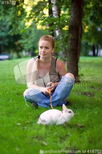 Image of girl with white rabbit