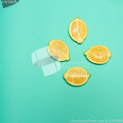 Image of Lemons on green background