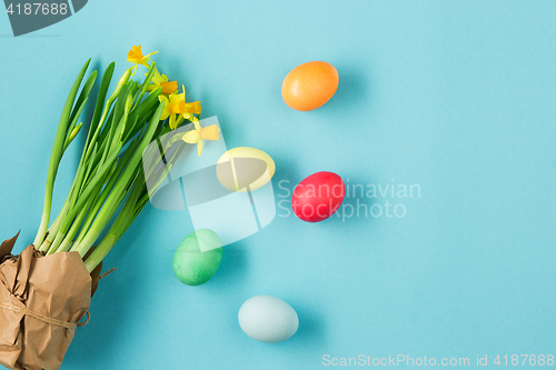 Image of The top view of easter on blue table office workplace