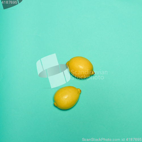 Image of Lemons on blue background