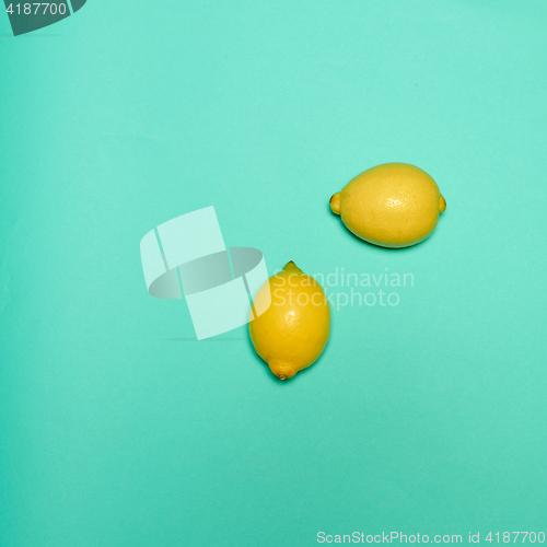 Image of Lemons on blue background