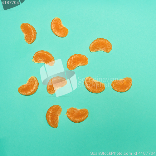 Image of Ripe Mandarin fruit peeled open