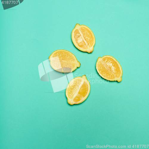 Image of Lemons on green background