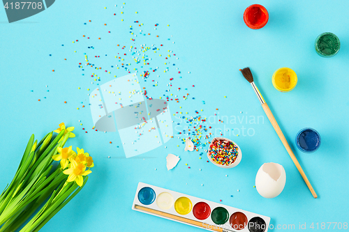 Image of The top view of easter on blue table office workplace