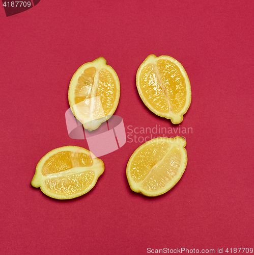 Image of Lemons on red background