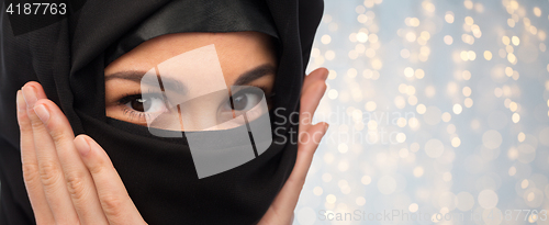 Image of close up of muslim woman in hijab