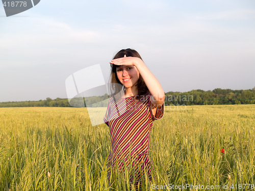 Image of Beautiful Teen Lady Looks in Field