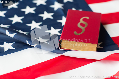 Image of close up of american flag and lawbook