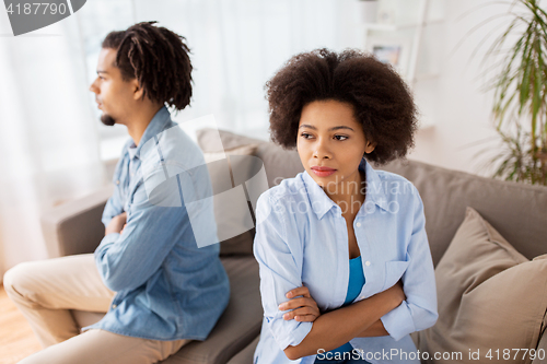 Image of unhappy couple having argument at home