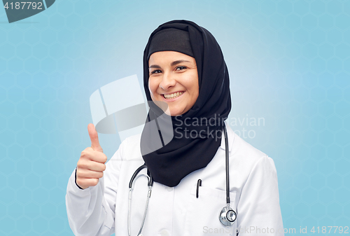 Image of muslim female doctor in hijab with stethoscope