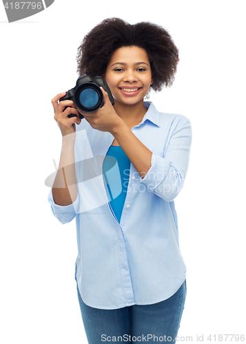 Image of happy afro american woman with digital camera