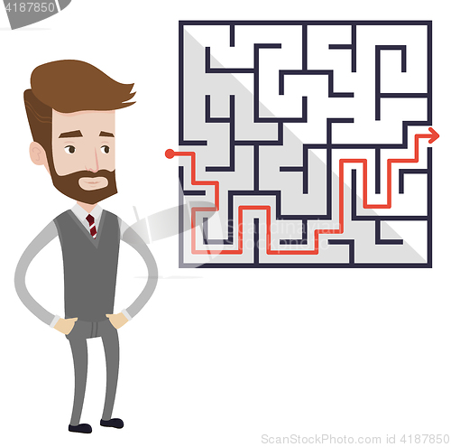 Image of Businessman looking at the labyrinth with solution