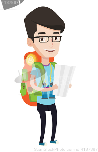 Image of Traveler with backpack looking at map.