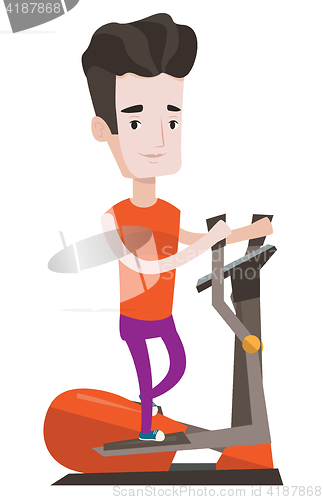 Image of Man exercising on elliptical trainer.