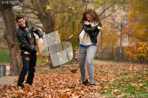 Image of Happy young Couple in Autumn Park