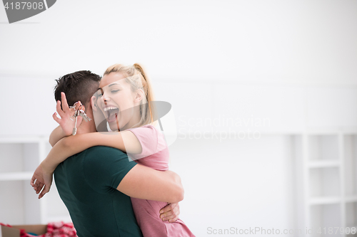 Image of happy Young couple moving in new house