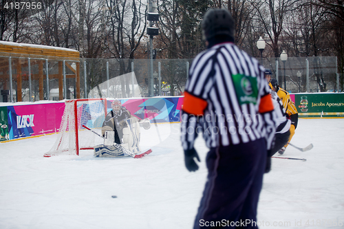 Image of Moscow, Russia - January, 15, 2017: Amateur hockey league LHL-77. Game between hockey team \"New Jersey 53\" and hockey team \"Black and white\".
