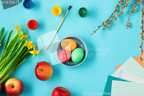 Image of The top view of easter on blue table office workplace