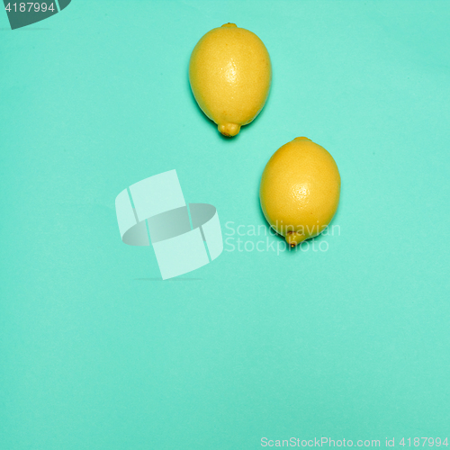 Image of Lemons on blue background