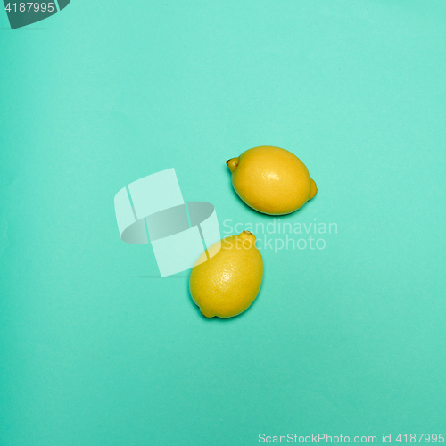 Image of Lemons on blue background