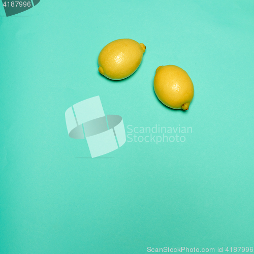 Image of Lemons on blue background