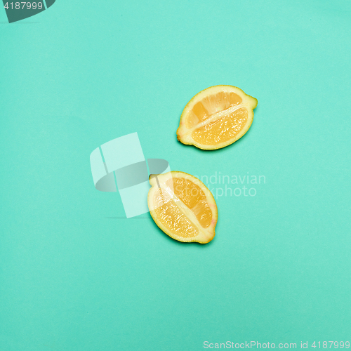 Image of Lemons on green background