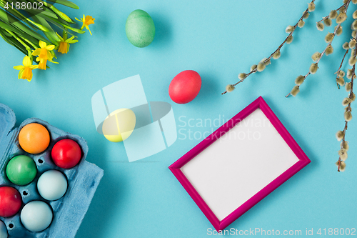 Image of The top view of easter on blue table office workplace