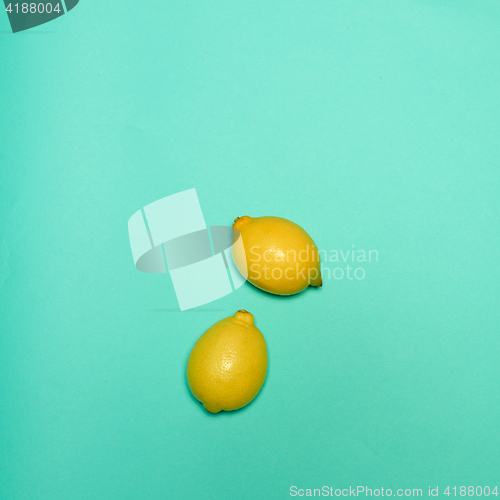 Image of Lemons on blue background