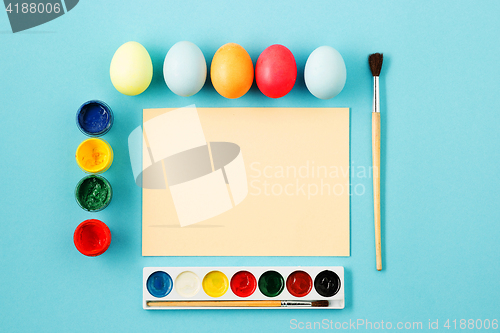 Image of The top view of easter on blue table office workplace