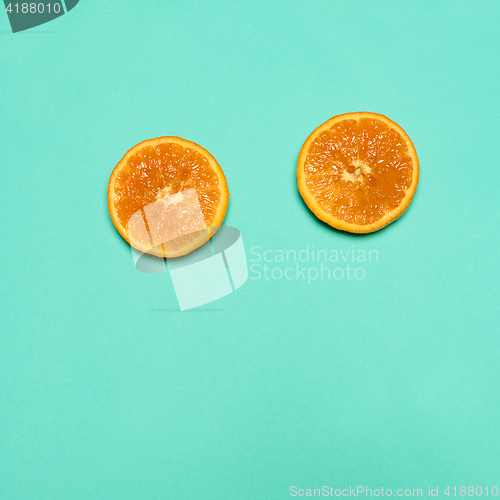 Image of Ripe Mandarin fruit peeled open