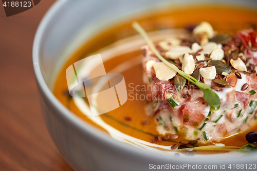 Image of close up of vegetable pumpkin-ginger soup in bowl
