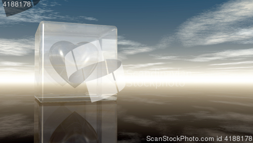 Image of heart symbol in glass cube under cloudy sky - 3d rendering