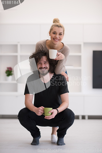 Image of Happy couple in their new home