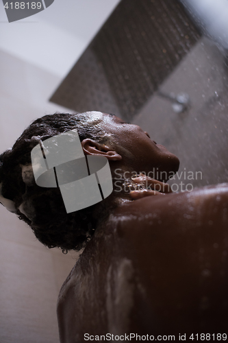 Image of African American woman in the shower