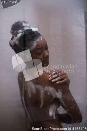 Image of African American woman in the shower