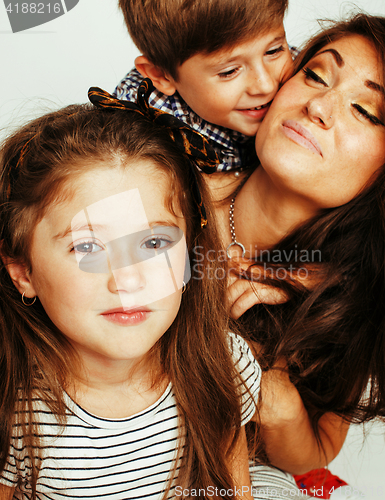 Image of young mother with two children on white, happy smiling family in