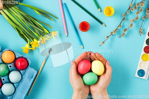 Image of The top view of easter on blue table office workplace