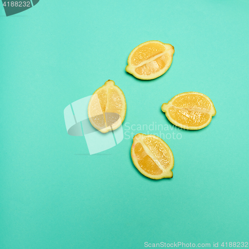 Image of Lemons on green background